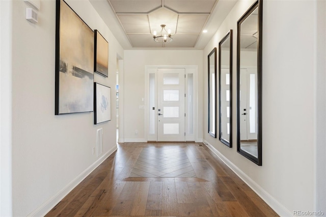 27381 E Lakeview Dr, Aurora, CO 80016 - foyer with dark wood-style floors and a chandelier