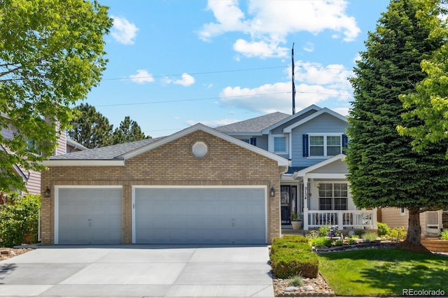 5134 S Ouray Ct, Centennial, CO 80015 - view of front of house with brick siding, concrete driveway, a garage, and a chimney