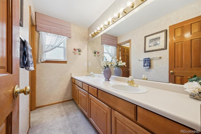 5134 S Ouray Ct, Centennial, CO 80015 - bathroom featuring double vanity and baseboards