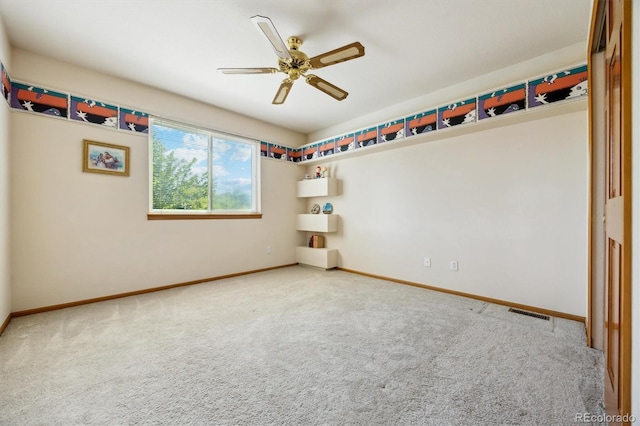 5134 S Ouray Ct, Centennial, CO 80015 - spare room with carpet floors, baseboards, and a ceiling fan