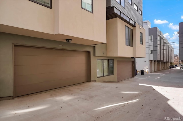 exterior space with a garage