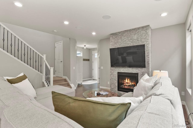 5841 Alton St, Denver, CO 80238 - living room with a fireplace, stairs, wood finished floors, and recessed lighting
