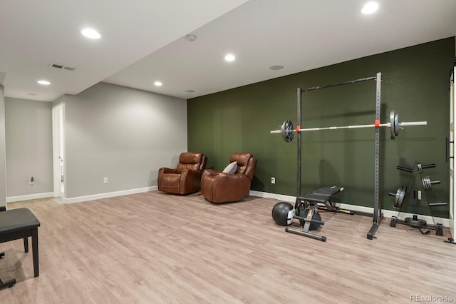 5841 Alton St, Denver, CO 80238 - workout area featuring wood finished floors and recessed lighting