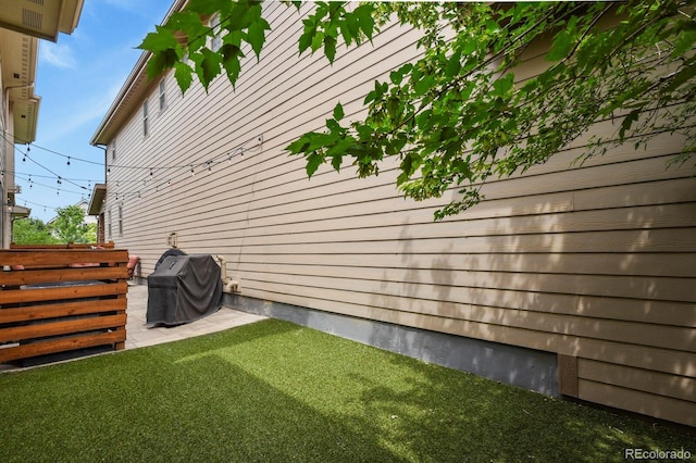 5841 Alton St, Denver, CO 80238 - view of property exterior with a patio area
