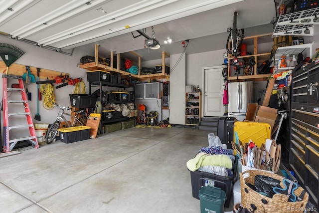 5841 Alton St, Denver, CO 80238 - garage featuring a garage door opener