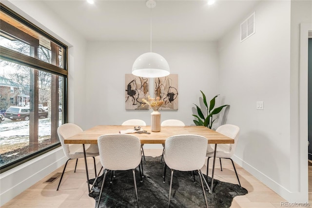 dining room featuring plenty of natural light