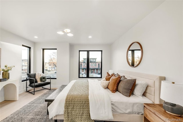 bedroom with light wood-type flooring