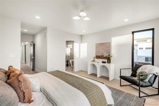 bedroom with light wood-type flooring