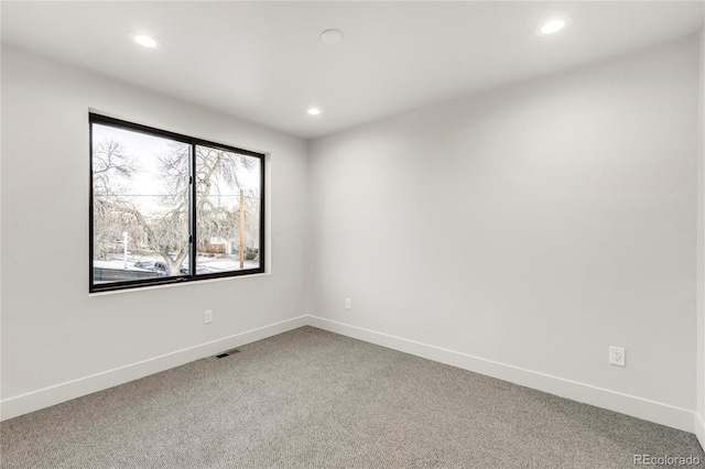 empty room featuring carpet floors