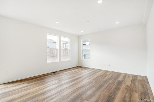 empty room featuring light hardwood / wood-style flooring