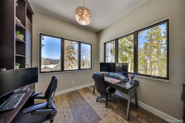 office with baseboards and wood-type flooring
