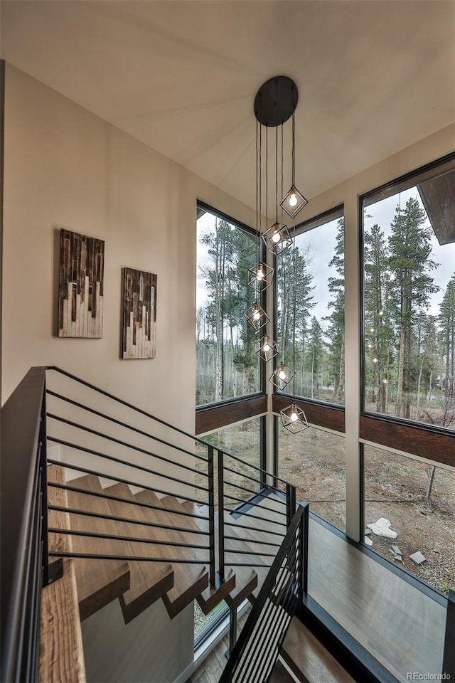 unfurnished sunroom with healthy amount of natural light