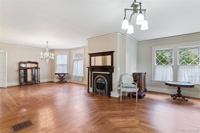 120 E Espanola St, Colorado Springs, CO 80907 - living area with a chandelier, healthy amount of natural light, a fireplace, and ornamental molding