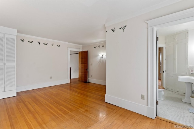 120 E Espanola St, Colorado Springs, CO 80907 - unfurnished room featuring light wood-style floors and ornamental molding