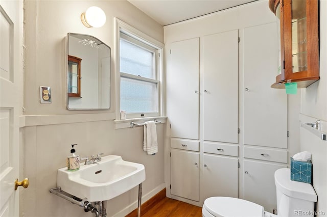 120 E Espanola St, Colorado Springs, CO 80907 - bathroom with toilet and wood finished floors