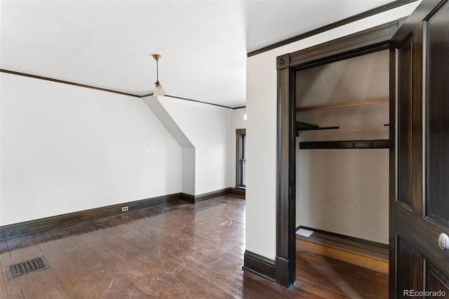 120 E Espanola St, Colorado Springs, CO 80907 - bonus room with dark wood finished floors and baseboards