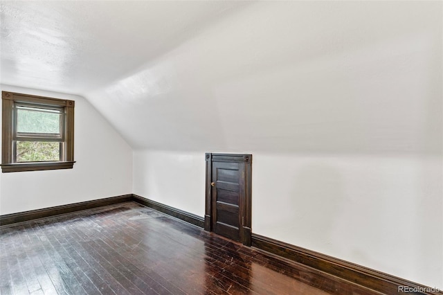120 E Espanola St, Colorado Springs, CO 80907 - bonus room featuring hardwood / wood-style floors and vaulted ceiling
