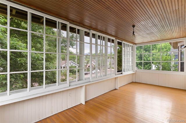 120 E Espanola St, Colorado Springs, CO 80907 - unfurnished sunroom with wooden ceiling and wooden walls