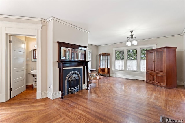 120 E Espanola St, Colorado Springs, CO 80907 - living area with a fireplace and crown molding