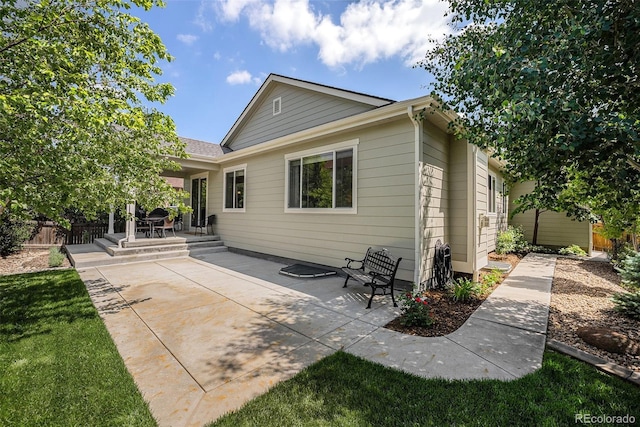 3406 Quicksilver Rd, Frederick, CO 80516 - rear view of house featuring a patio