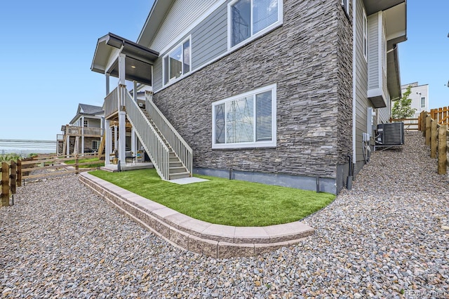 5134 Queen Ct, Arvada, CO 80002 - back of house with stairs and stone siding