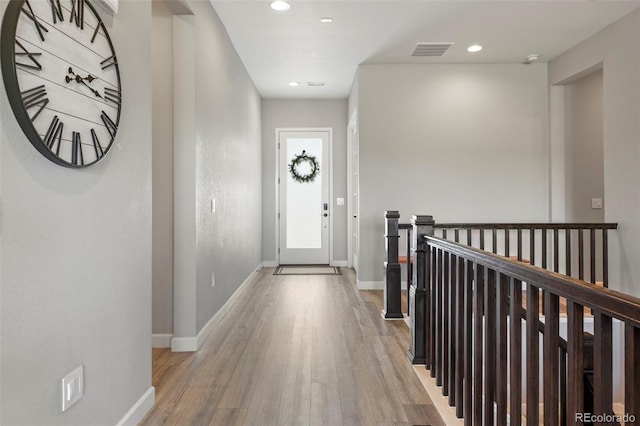 7000 S White Crow Way, Aurora, CO 80016 - entrance foyer featuring wood finished floors and recessed lighting