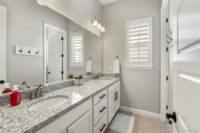 7000 S White Crow Way, Aurora, CO 80016 - bathroom featuring double vanity and tile patterned flooring