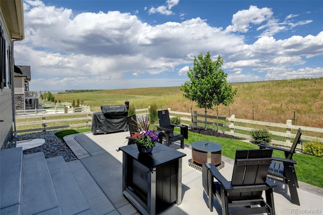7000 S White Crow Way, Aurora, CO 80016 - view of patio / terrace with a rural view and a grill