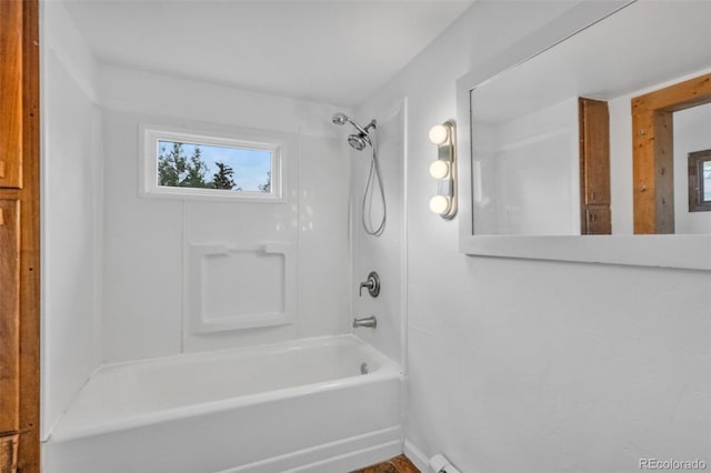 bathroom with shower / bathing tub combination