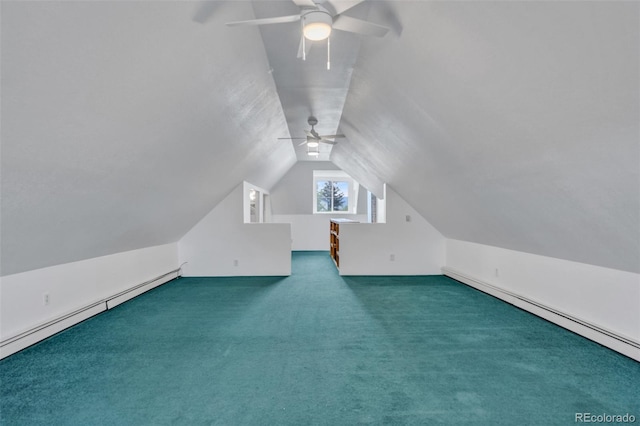 bonus room with ceiling fan, lofted ceiling, baseboard heating, and dark colored carpet