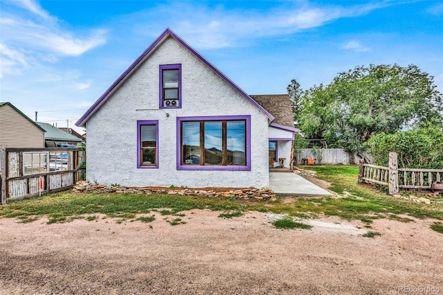 rear view of house featuring a patio area