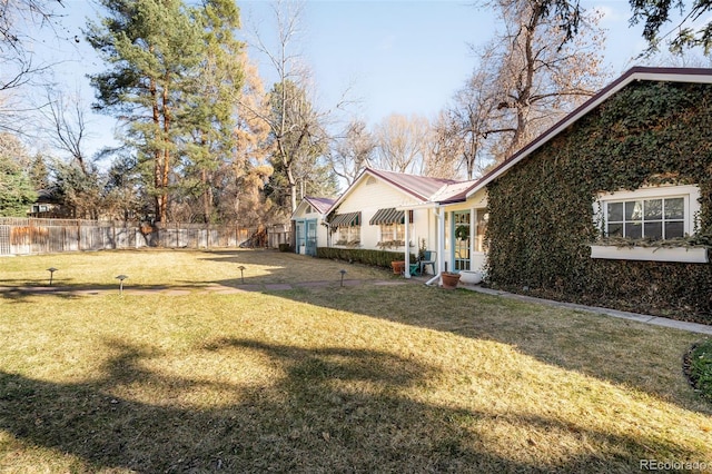 view of yard with fence