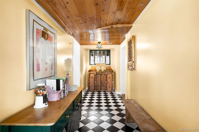 corridor featuring wooden ceiling and tile patterned floors