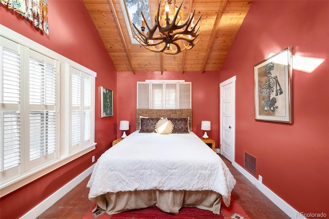 bedroom featuring wooden ceiling, visible vents, baseboards, and an inviting chandelier