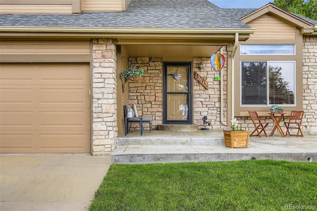 12013 W 56th Cir, Arvada, CO 80002 - entrance to property with roof with shingles, a garage, driveway, a porch, and stone siding