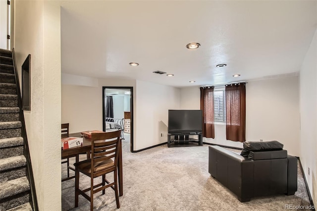12013 W 56th Cir, Arvada, CO 80002 - living room with light colored carpet, stairway, and recessed lighting