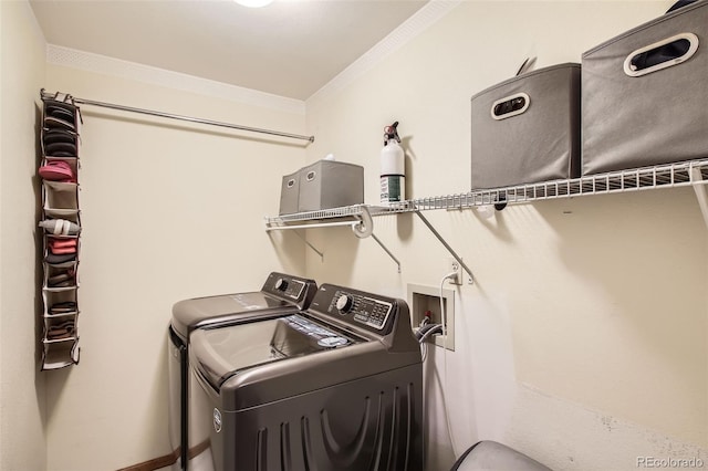 12013 W 56th Cir, Arvada, CO 80002 - washroom featuring separate washer and dryer and ornamental molding