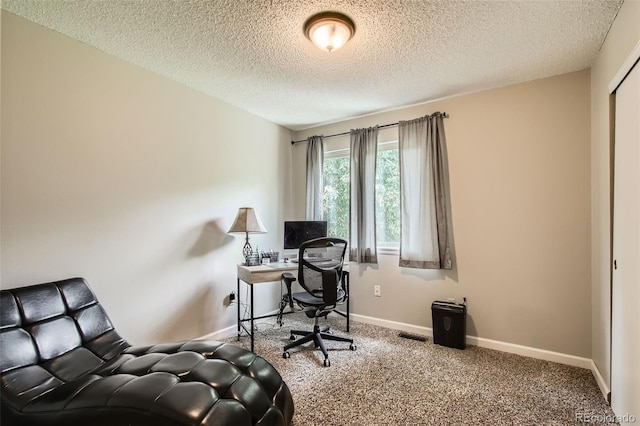 12013 W 56th Cir, Arvada, CO 80002 - carpeted home office featuring a textured ceiling and baseboards