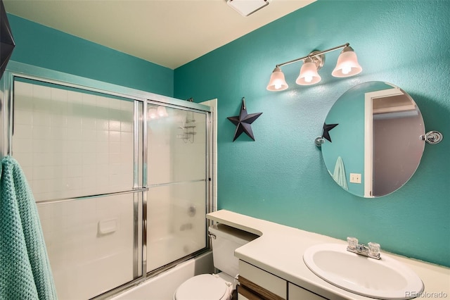 12013 W 56th Cir, Arvada, CO 80002 - full bath with vanity, combined bath / shower with glass door, and a textured wall