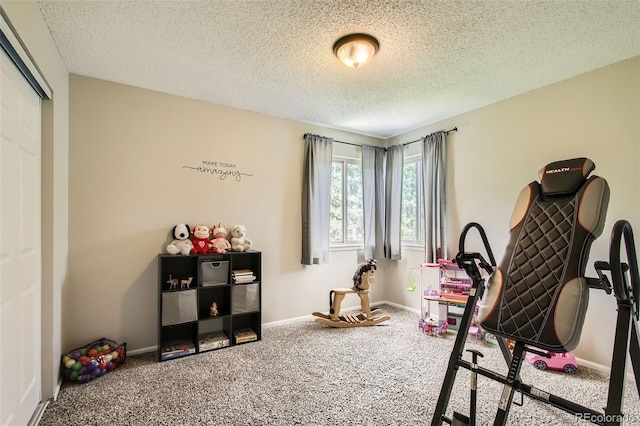 12013 W 56th Cir, Arvada, CO 80002 - exercise area featuring carpet flooring and a textured ceiling