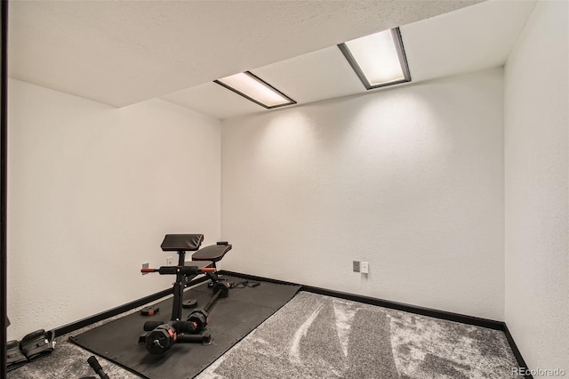 12013 W 56th Cir, Arvada, CO 80002 - workout area featuring carpet flooring and baseboards