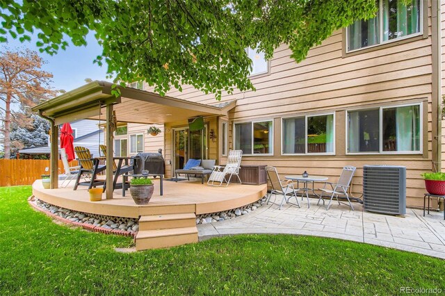 12013 W 56th Cir, Arvada, CO 80002 - view of patio / terrace with a wooden deck and a grill