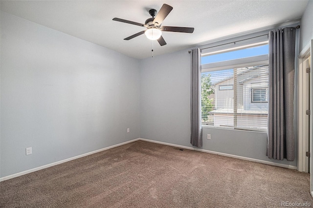 5048 N Andes St, Denver, CO 80249 - carpeted spare room featuring ceiling fan and baseboards