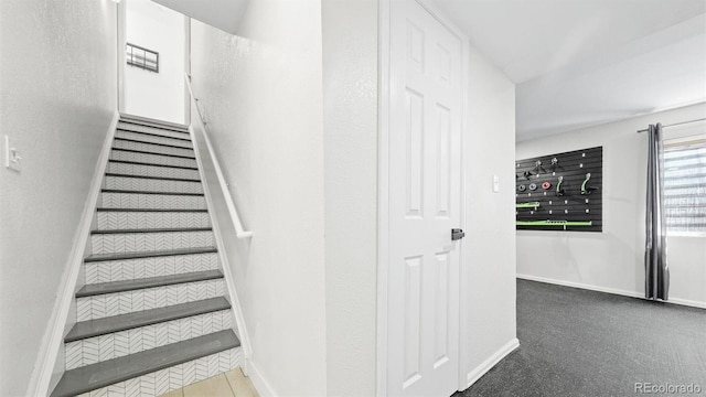 staircase with baseboards