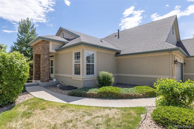 view of property exterior featuring a garage