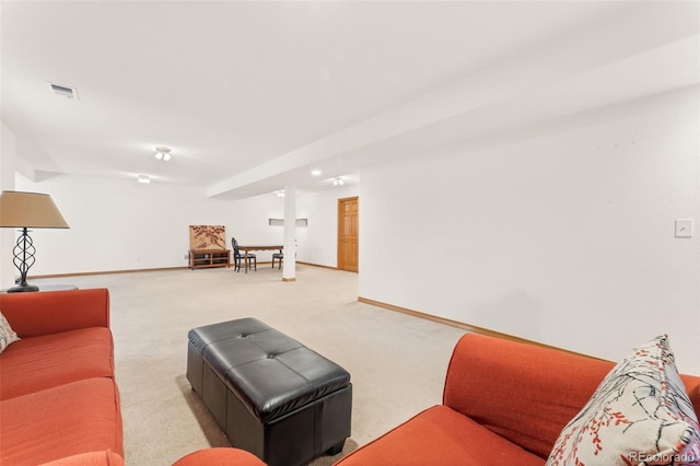 living room with light colored carpet