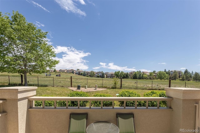 balcony featuring a rural view