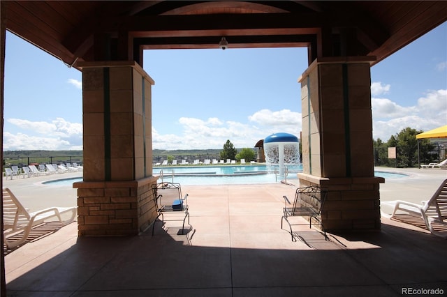4955 Trails Edge Ln, Castle Rock, CO 80104 - view of patio / terrace with a community pool