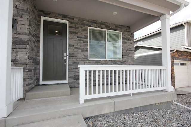 4955 Trails Edge Ln, Castle Rock, CO 80104 - property entrance with a porch and stone siding