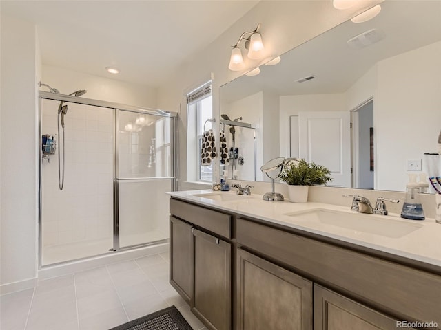4955 Trails Edge Ln, Castle Rock, CO 80104 - full bathroom with a stall shower, tile patterned flooring, and double vanity